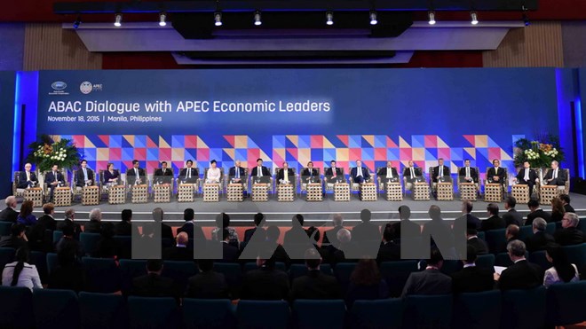 Chủ tịch nước Trương Tấn Sang (thứ 2, phải) và các đại biểu tham dự đối thoại các nhà lãnh đạo APEC và thành viên ABAC. (Nguồn: THX/TTXVN)