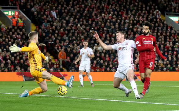 Salah đệm bóng mở tỉ số ngay phút thứ tư cho Liverpool