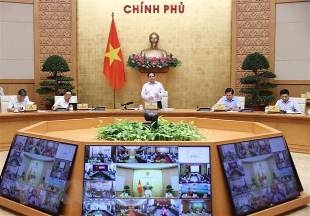 Thủ tướng Phạm Minh Chính chủ trì Hội nghị trực tuyến Chính phủ với địa phương và Phiên họp Chính phủ thường kỳ tháng Chín năm 2022. (Ảnh: Dương Giang/TTXVN)