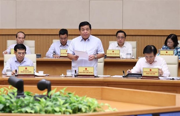 Bộ trưởng Bộ Kế hoạch và Đầu tư Nguyễn Chí Dũng báo cáo tình hình kinh tế - xã hội tháng 9 và 9 tháng năm 2022. (Ảnh: Dương Giang/TTXVN)